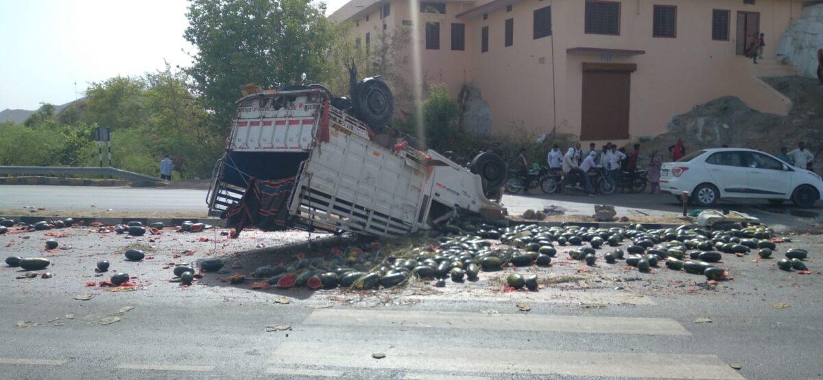 Pickup overturned due to tire burst, driver narrowly saved